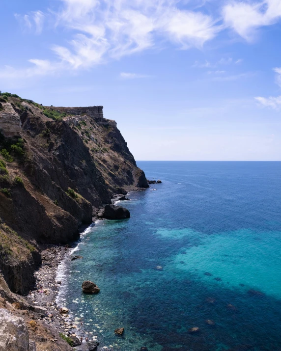 an image of the ocean taken from a hillside