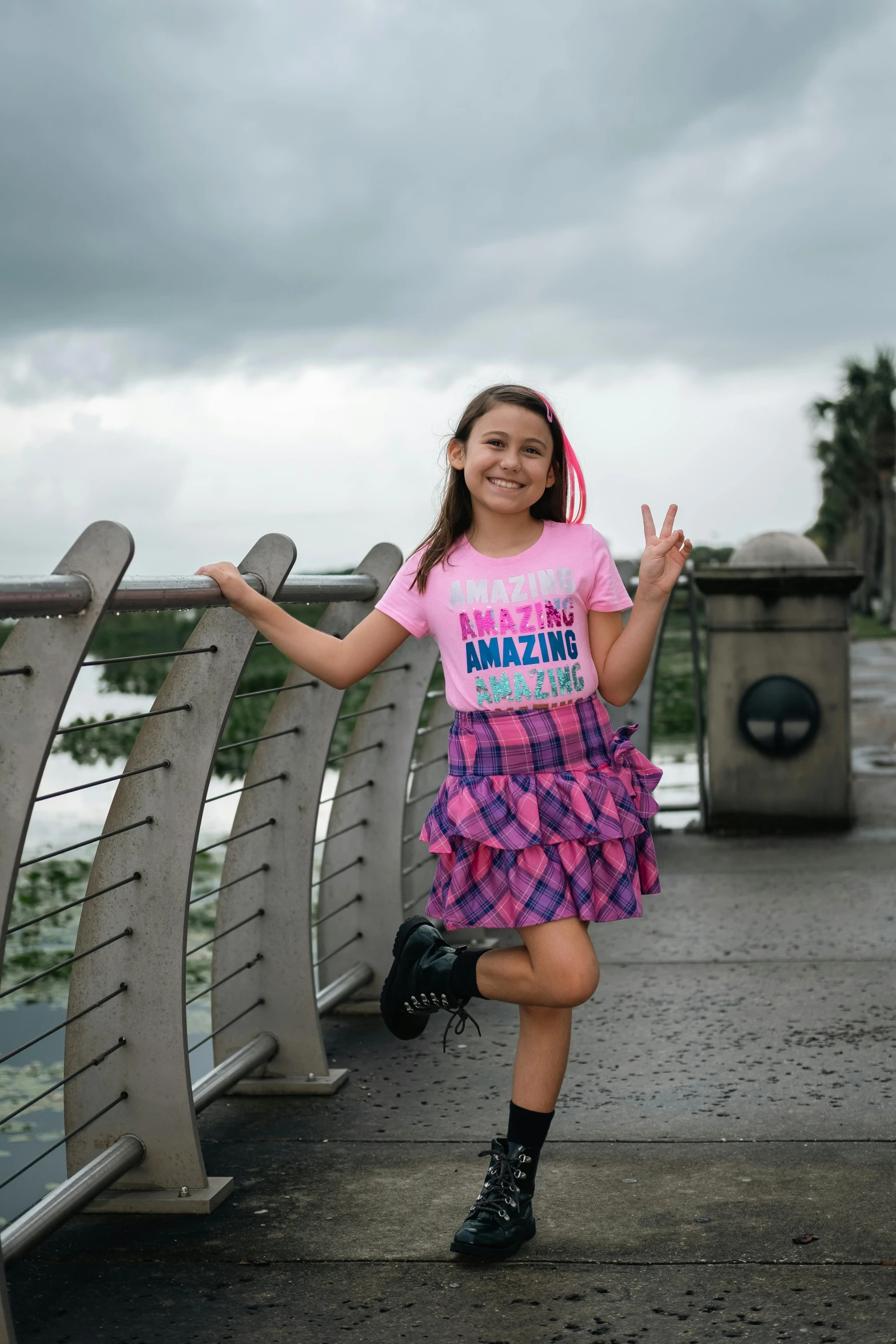 a small child in a skirt and a shirt