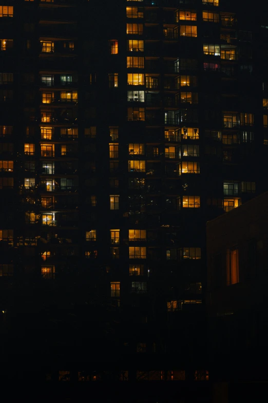 a picture of some building windows at night