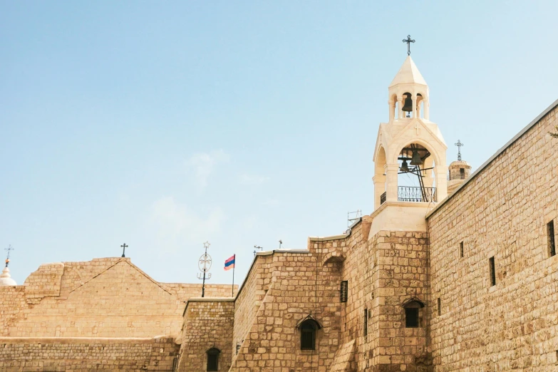 the church's steeple is made from large brick blocks