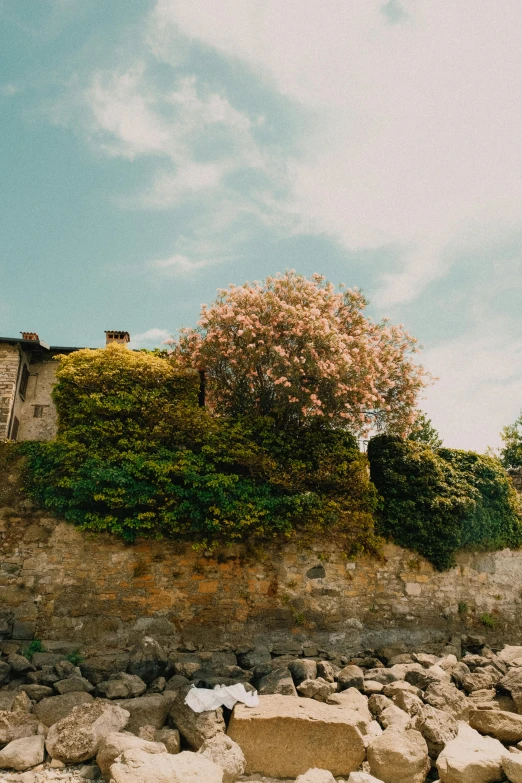 this is an old house on the side of a hill