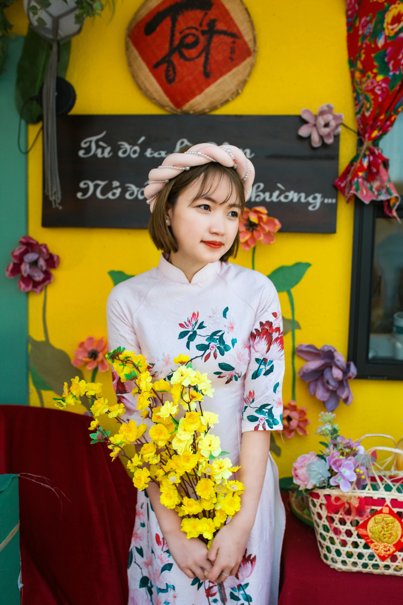 the woman is wearing a han tang outfit and has flowers in her hand