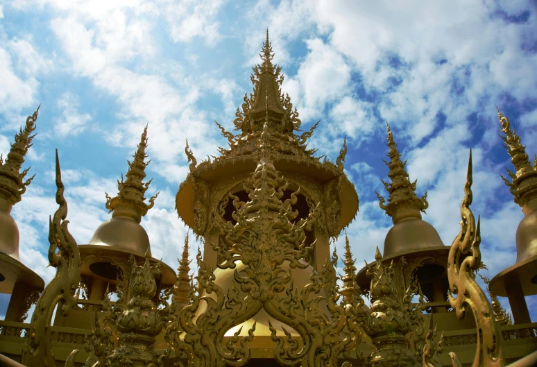 a building is shown with many spires and clocks