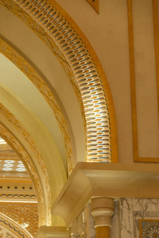 a clock on the wall in a large hallway