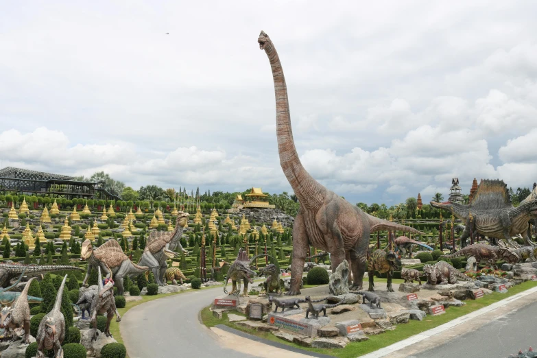 an exhibit in a theme park filled with dinosaurs and dinosaurs