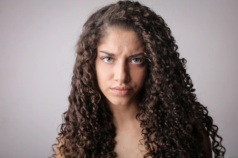 there is a woman with long curly hair