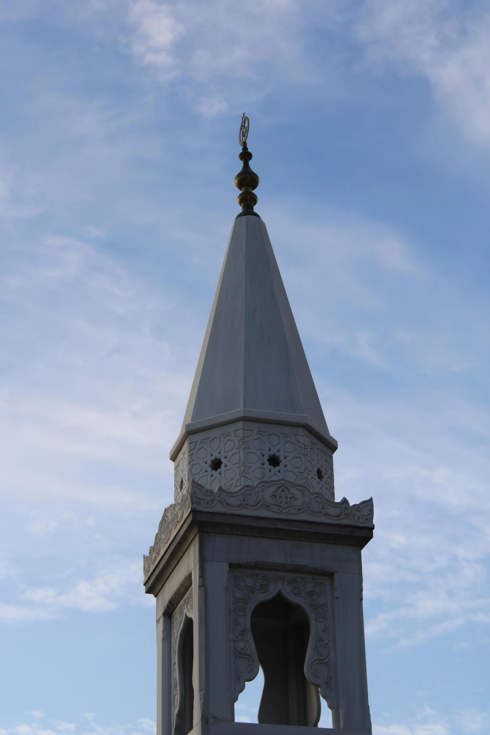 a tower that is in the middle of some water