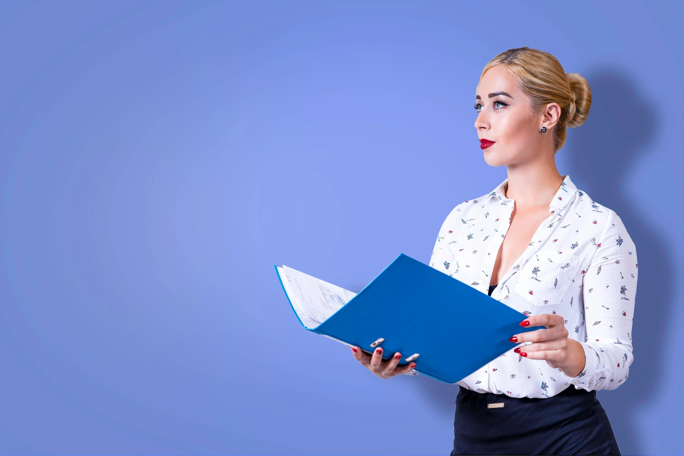 an office woman with a binder and shirt holds a folder