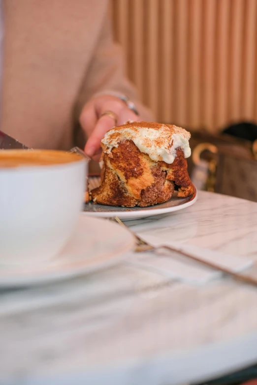 a plate with food sitting on top of a table