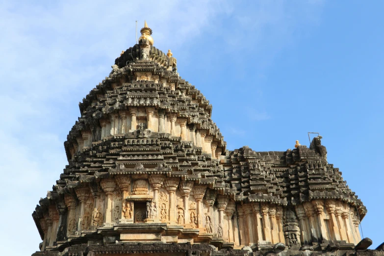 the ornate architecture on the top of a stone building