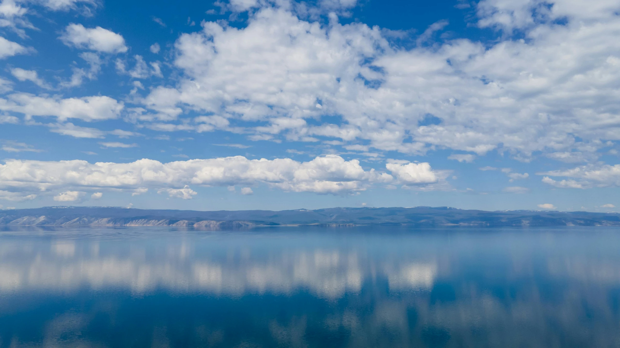 a big lake that has some calm water on it