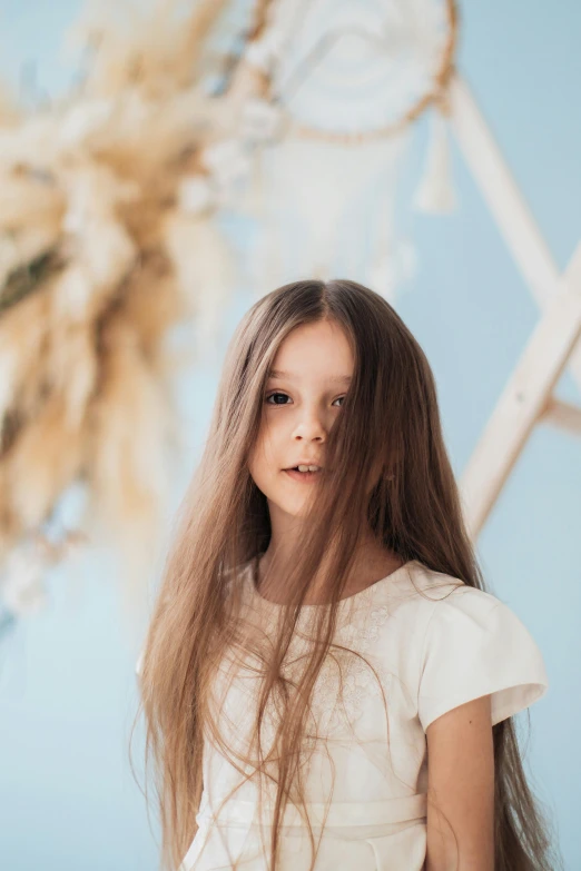 a close up of a young woman with long hair