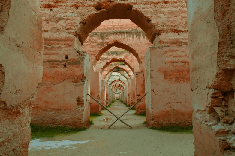 some stone and brick buildings with a few arches