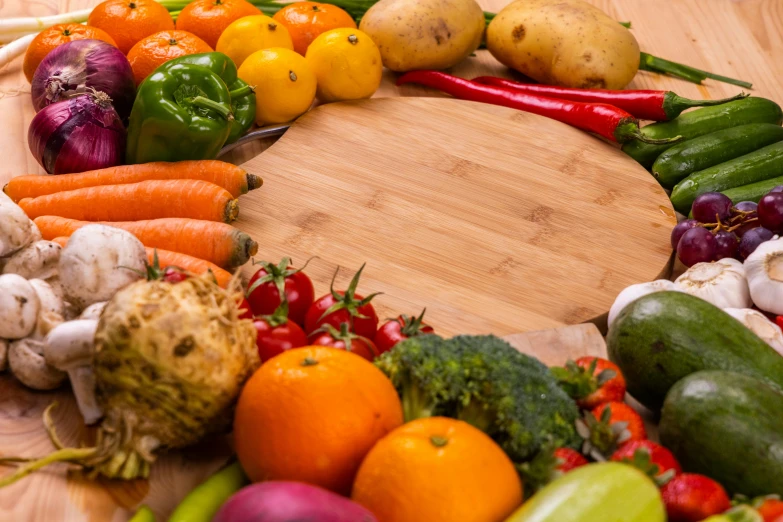 a variety of fruits and vegetables are arranged on the table