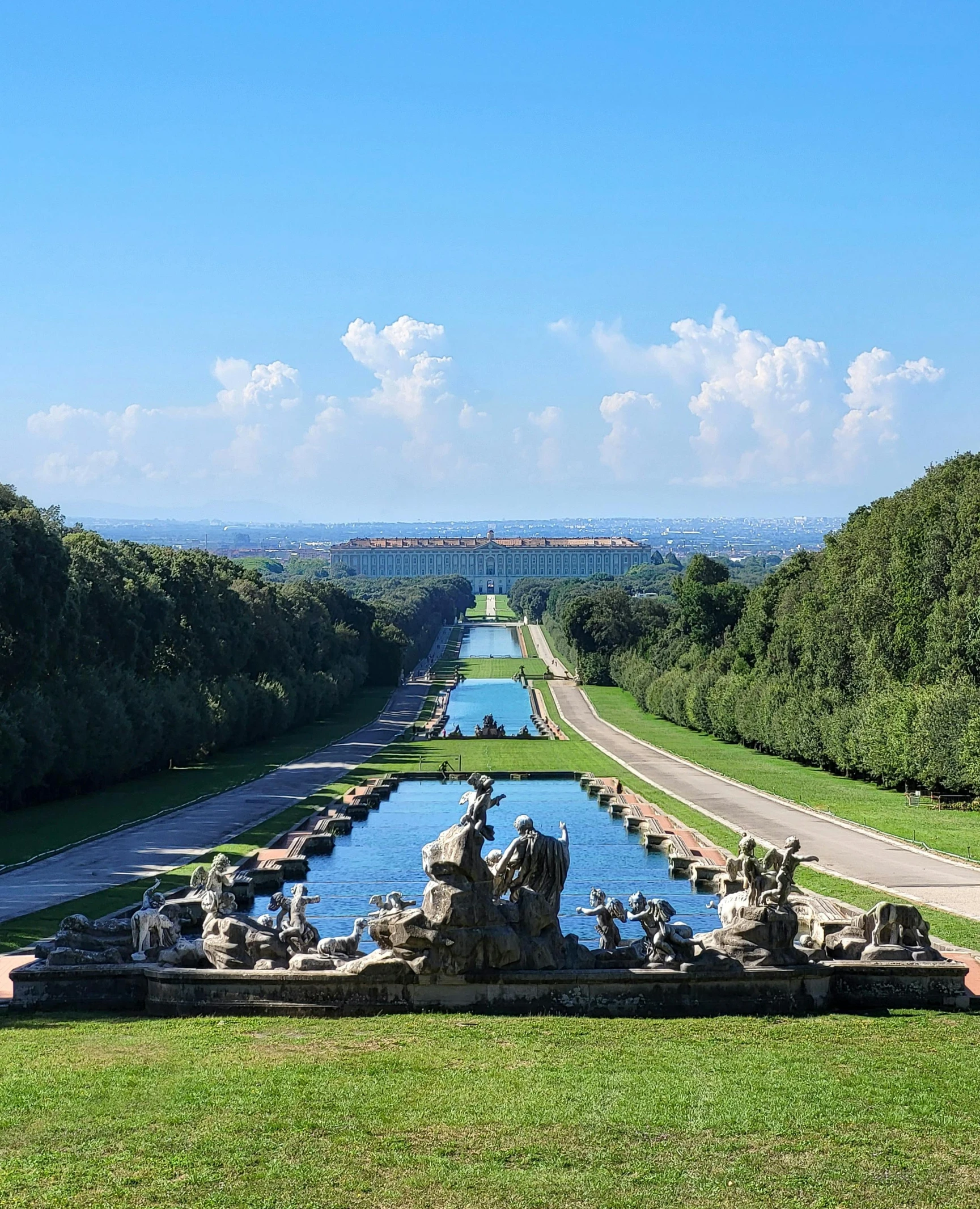 this po is looking down the side of a hill with a fountain in it