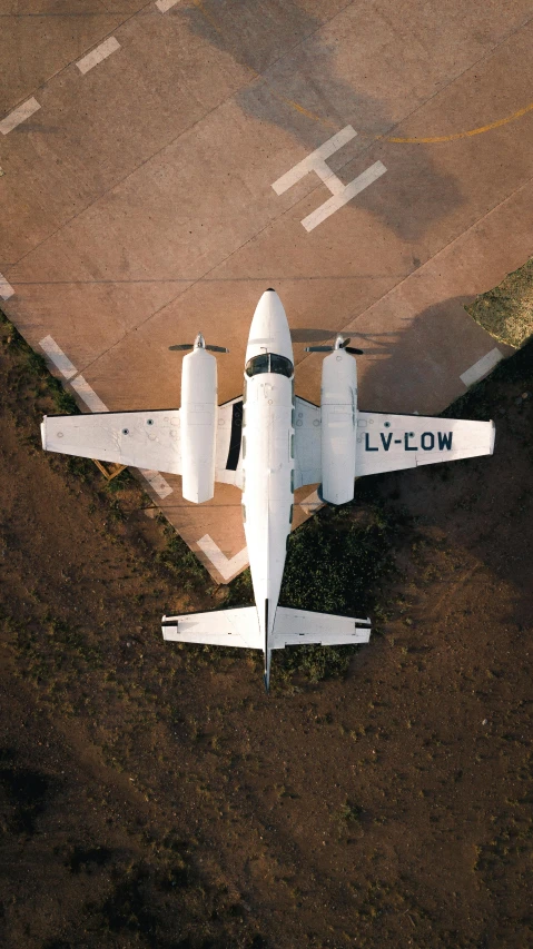 the large white plane has landing gear out