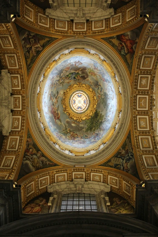 the top of a ceiling with painting on it