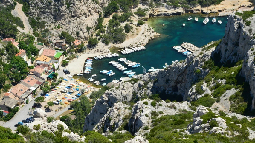 a bird's eye view of boats and buildings in a cove