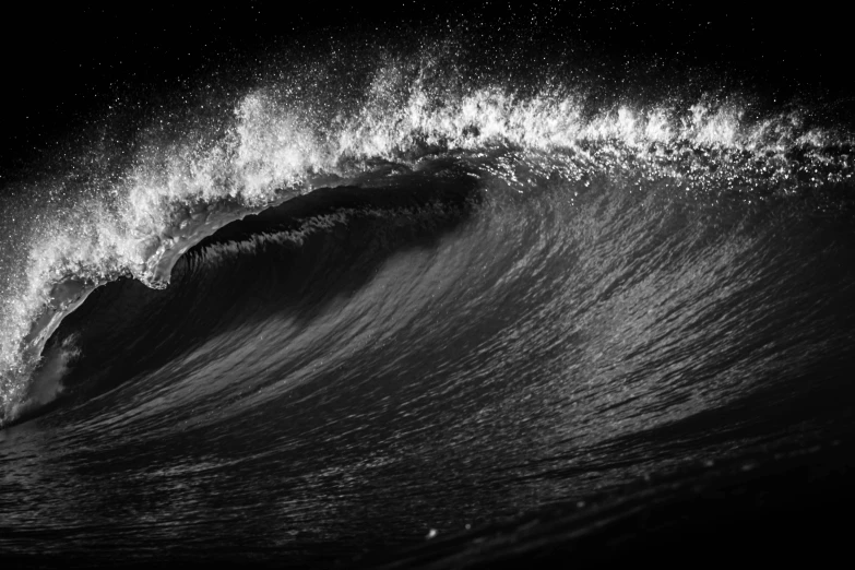 a dark po of an ocean wave in the water