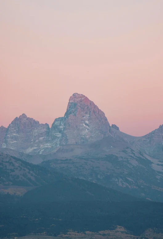 mountain range in the sunset with pink sky