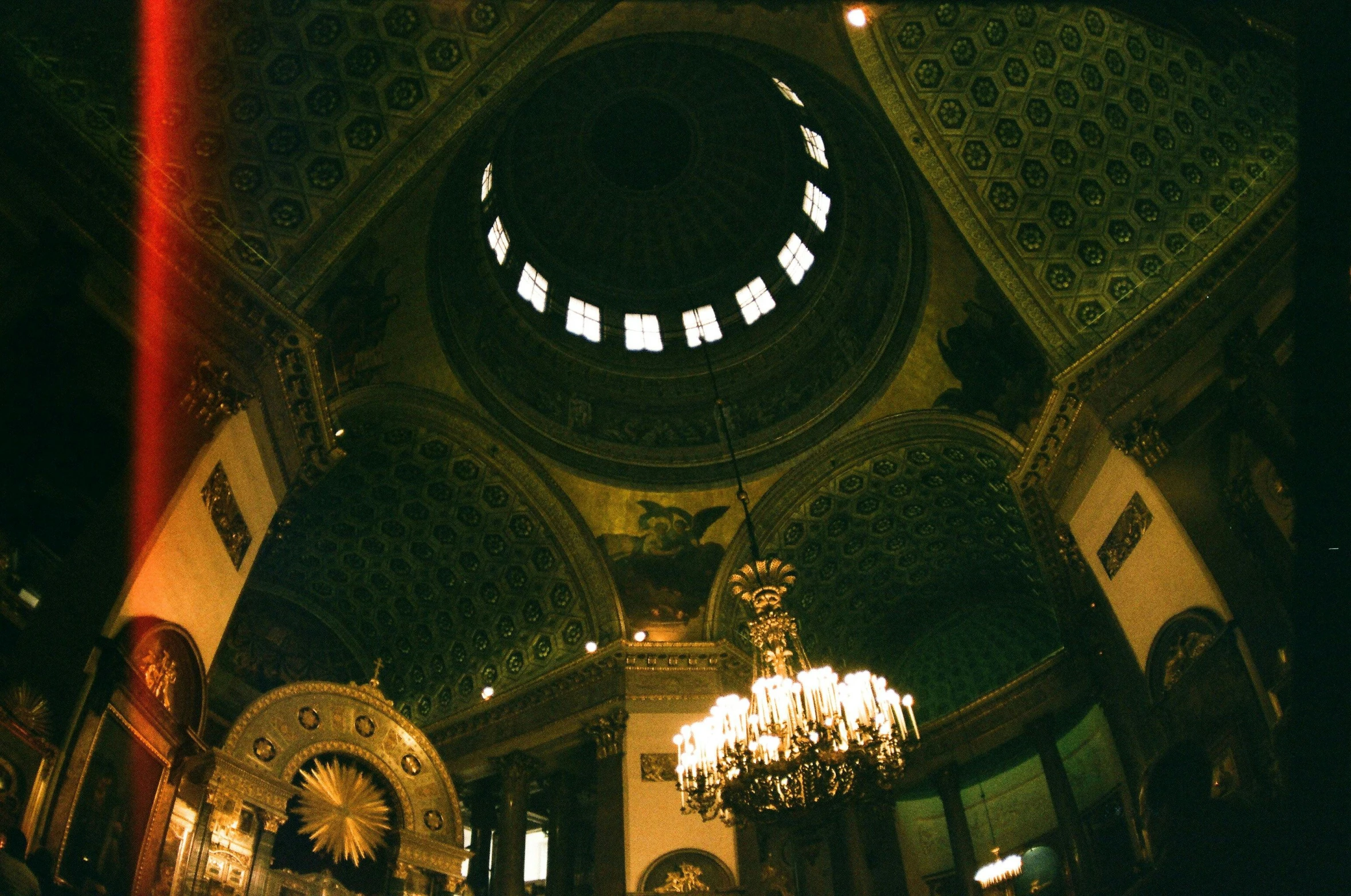 a chandelier hanging from a ceiling in a building