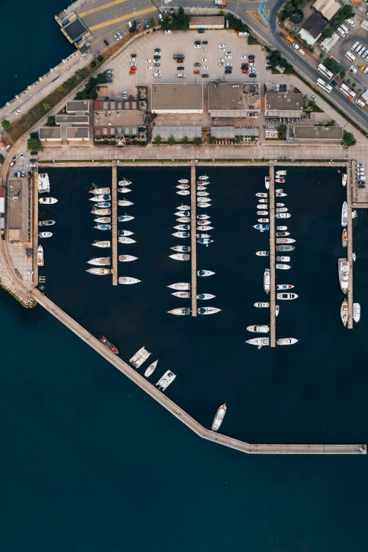 a marina with many small boats on the water