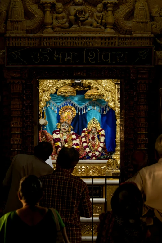 a picture of a large god in a temple