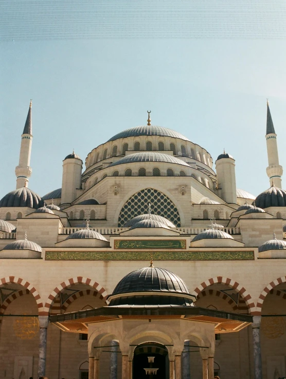 a very big pretty building with many dome