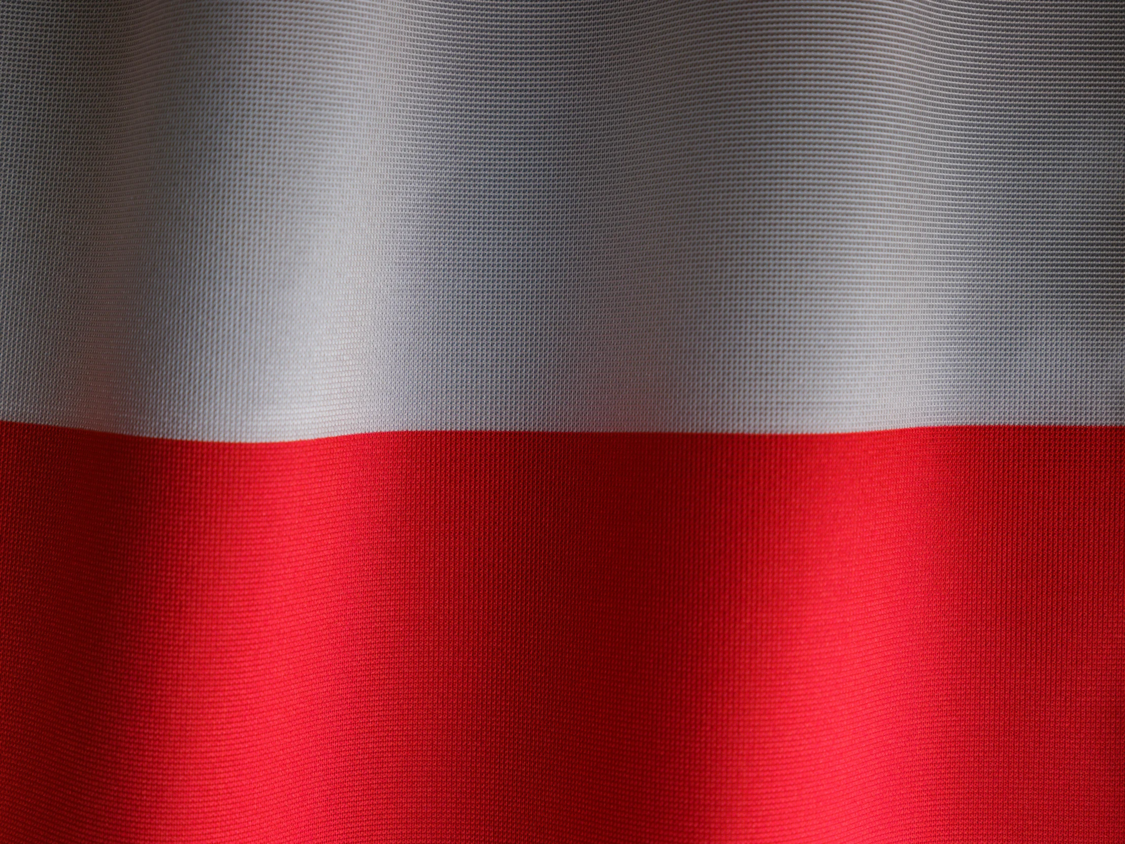 the image shows a red gray and white curtain