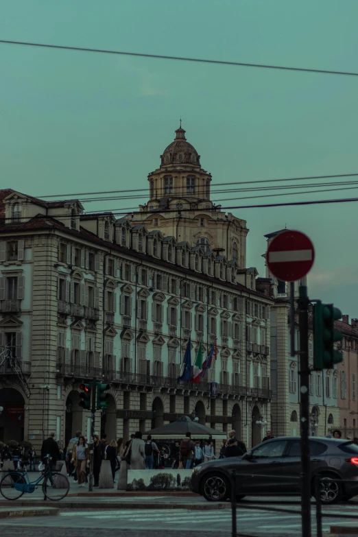 a view from a busy street corner of a building