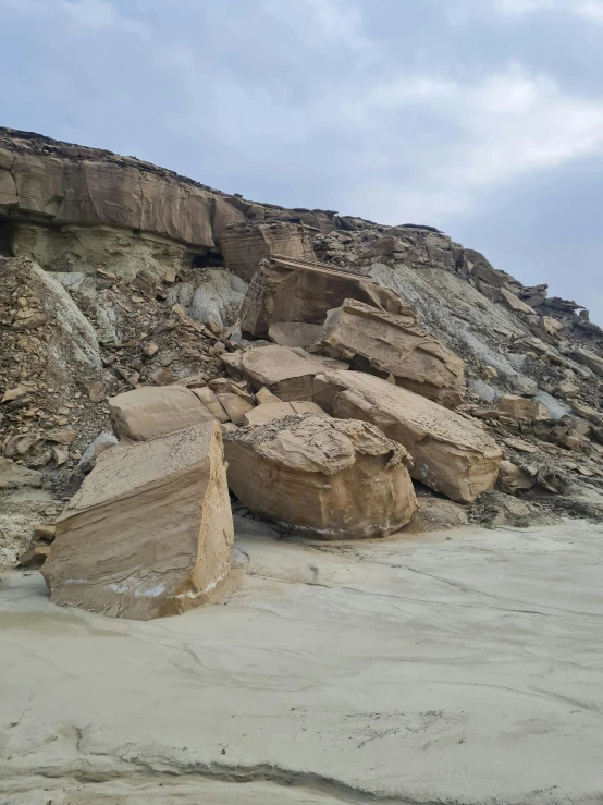 there is a rocky outcrop with stones embedded in them