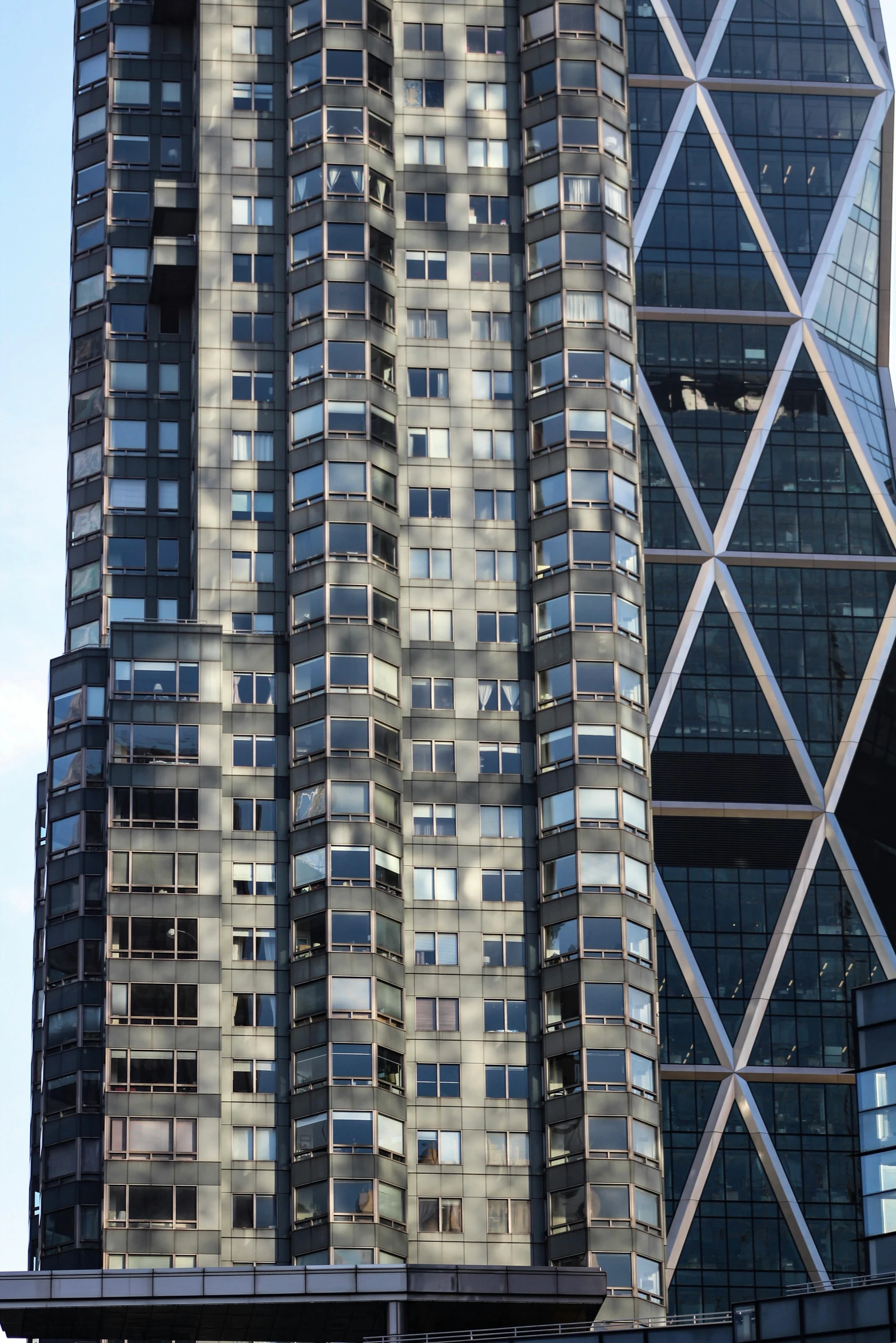 a large glass and steel building with many windows