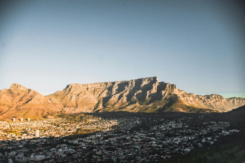 a very tall mountain in the distance