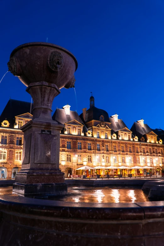 a large building is lit up at night