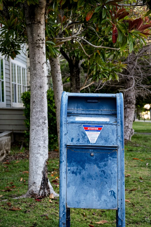 a mail box with an advertit for a service