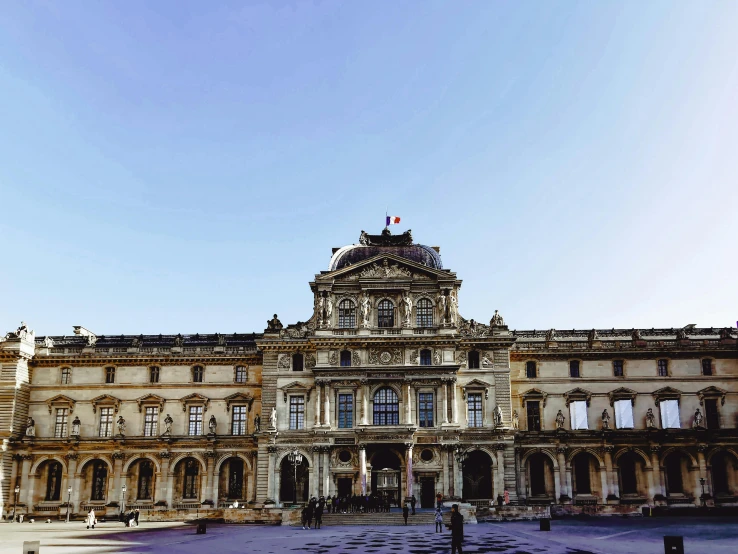 a big building with a sky background