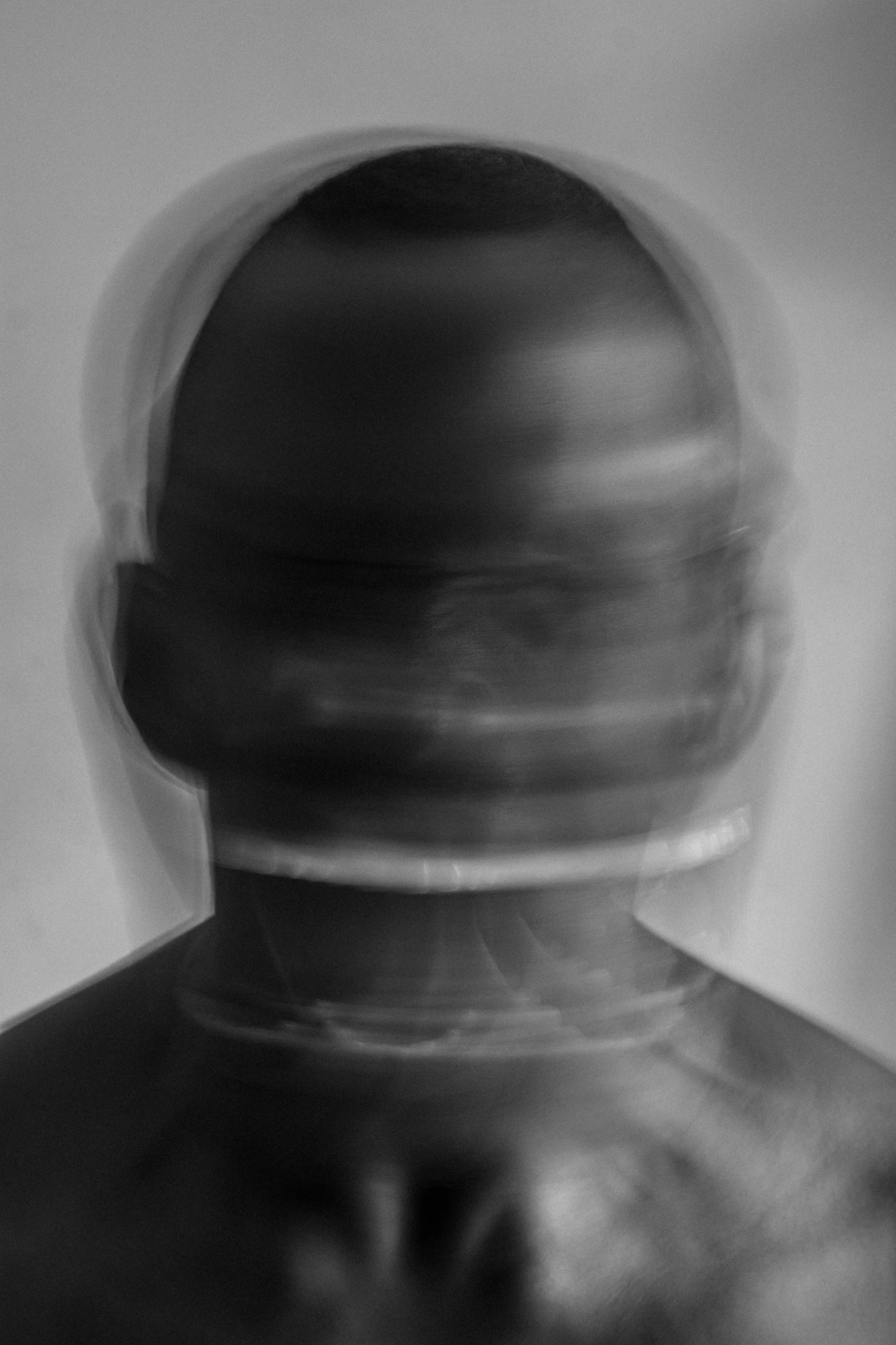 a person wearing a helmet with blurry pos of him
