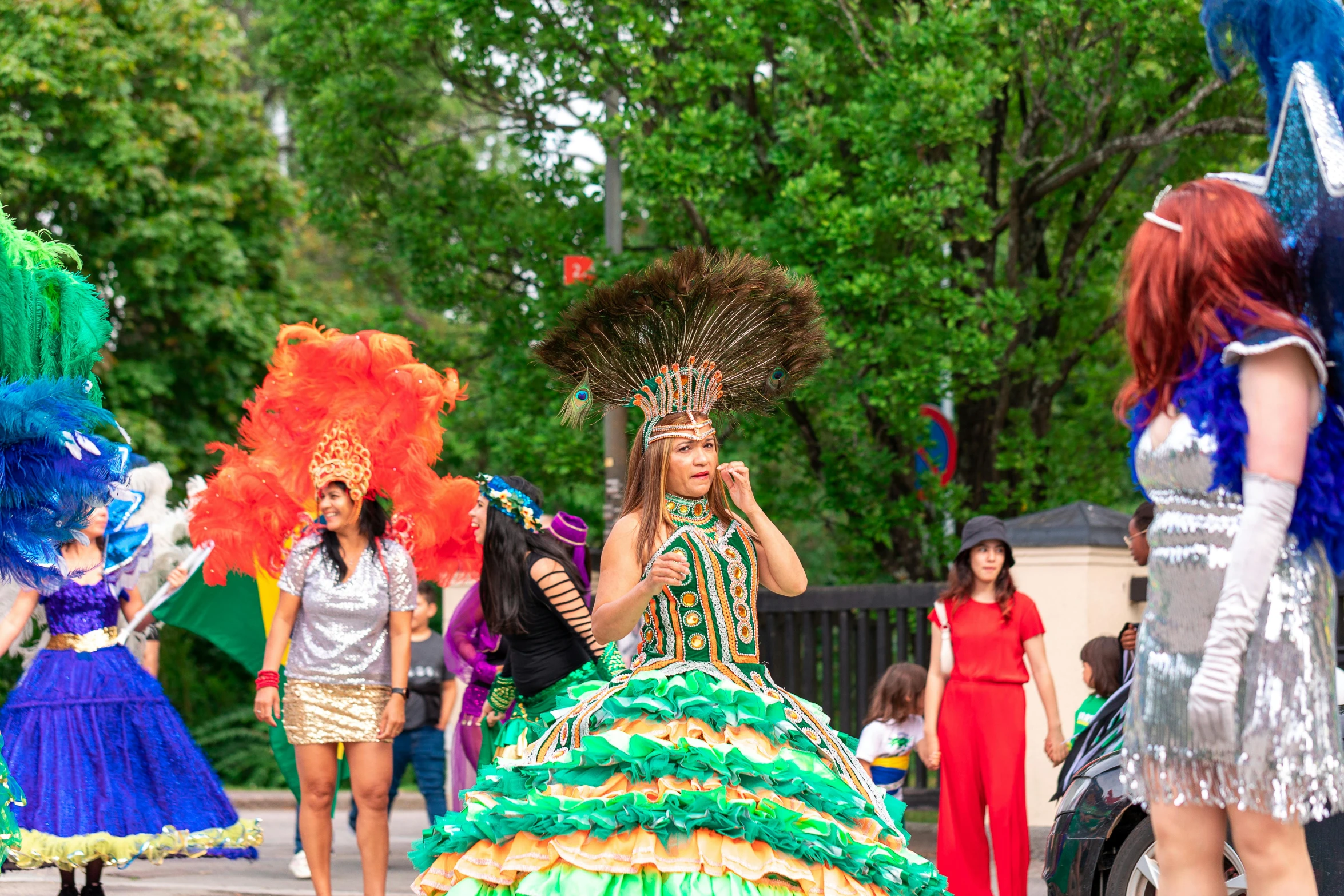 a group of ladies in costume walking around