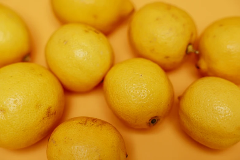 the lemons are lined up next to each other