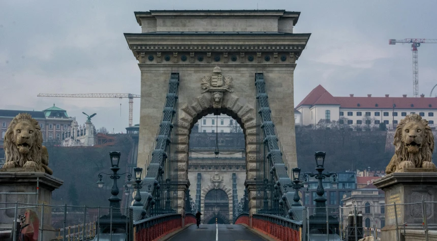 a very big pretty bridge with some statues