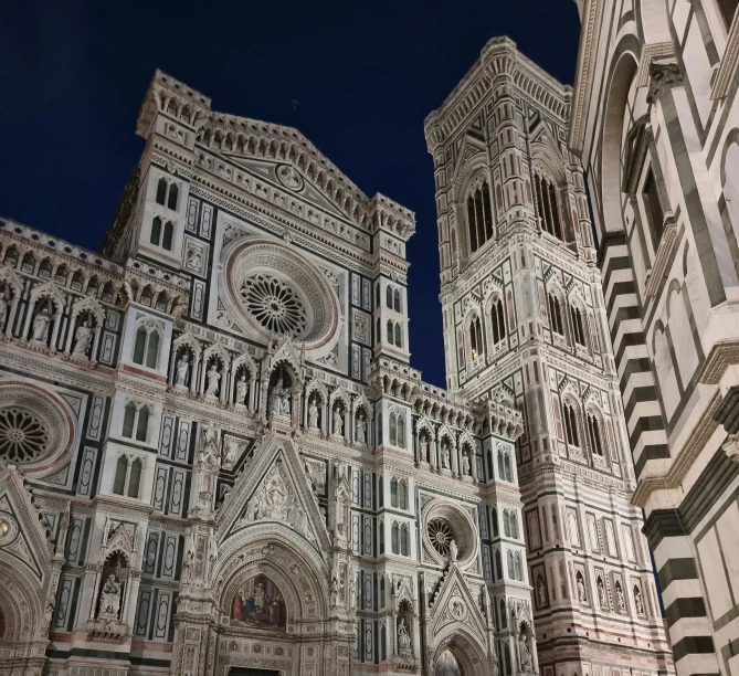 a large church at night with a lot of lights on