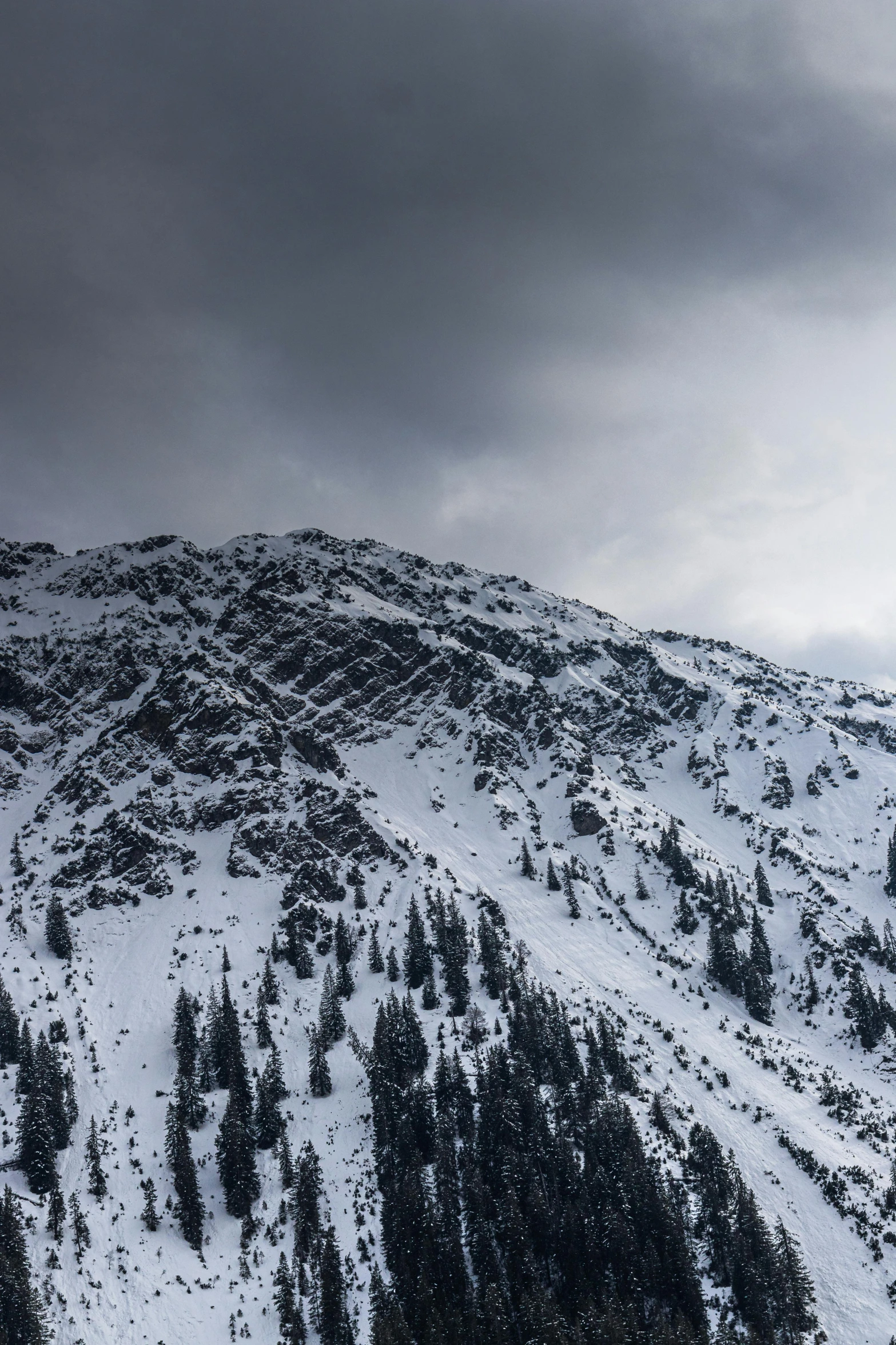 a very high view of a very snowy mountain