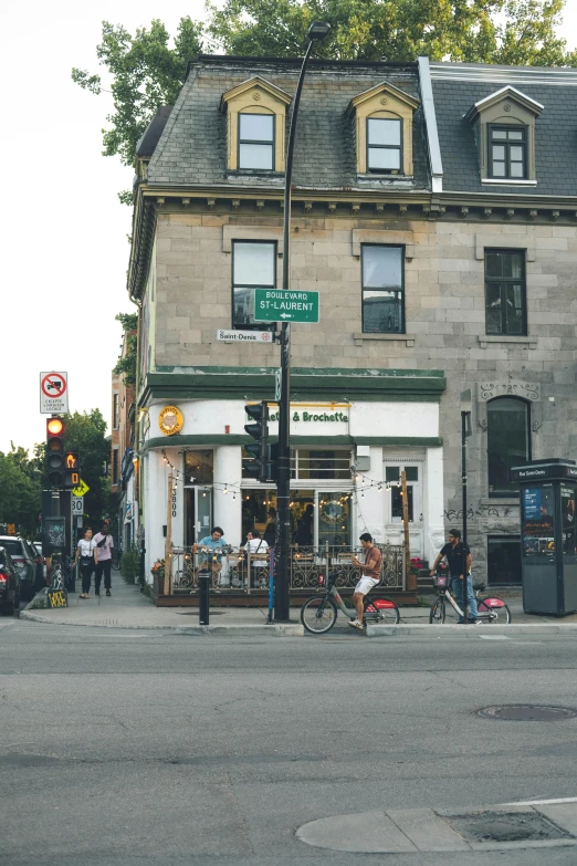 a street view showing the corner of a store