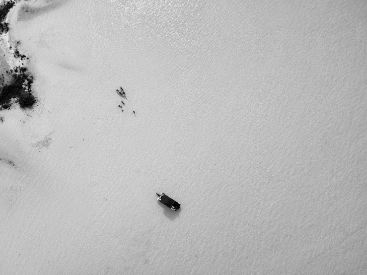 there is a small boat in the snow