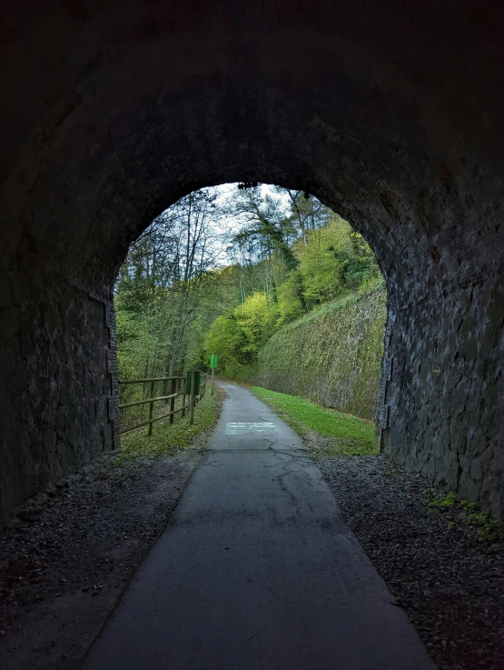 a tunnel on a hill has fallen apart