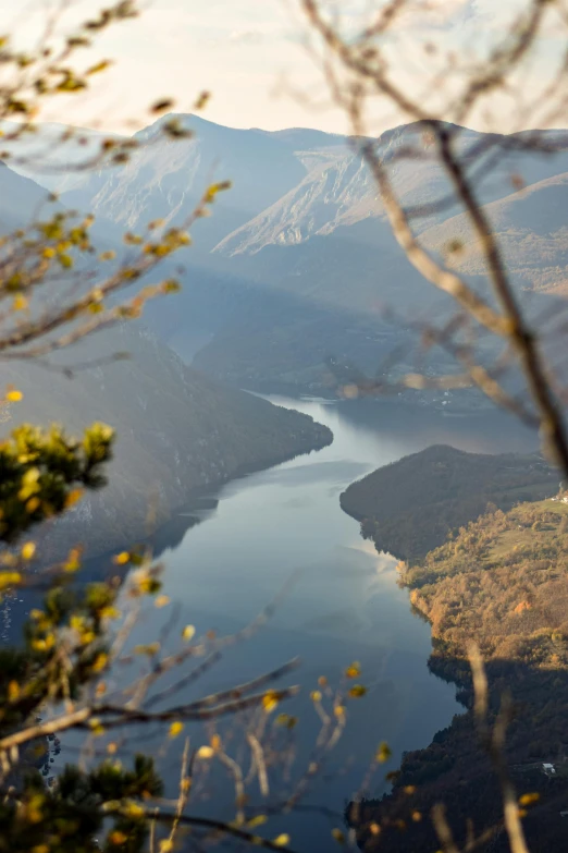 a view over a body of water from high up on the mountain