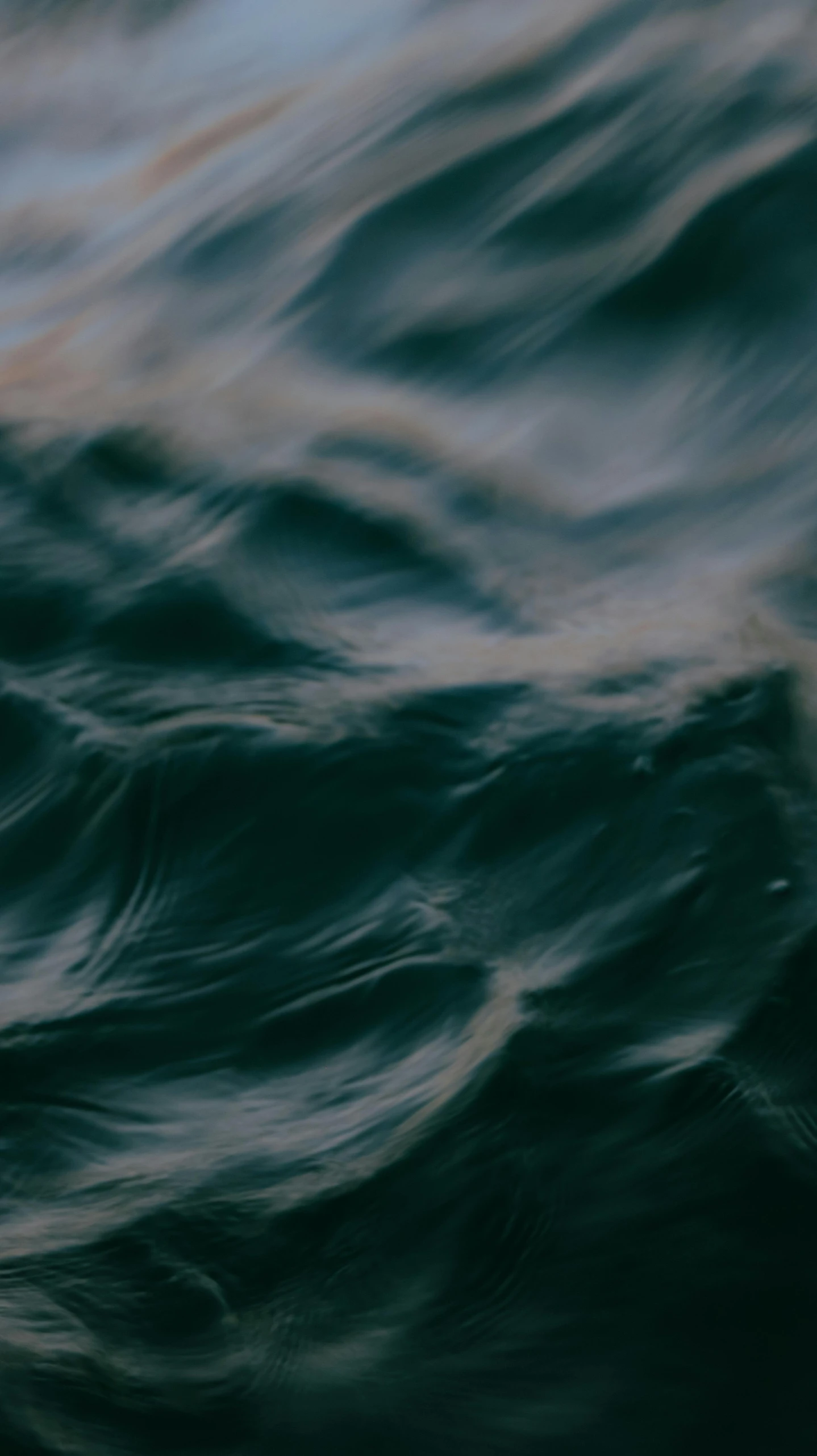 an object floating on the water near shore