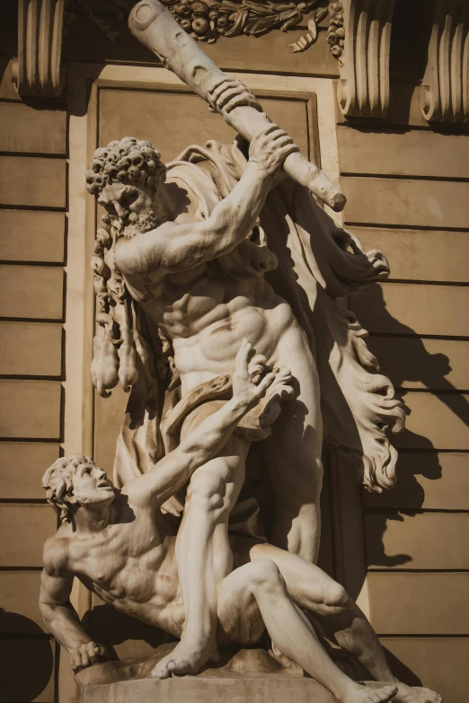 the marble sculpture shows a group of  figures