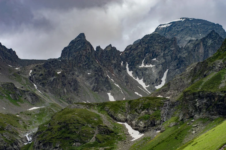 the majestic peaks of some mountain are green