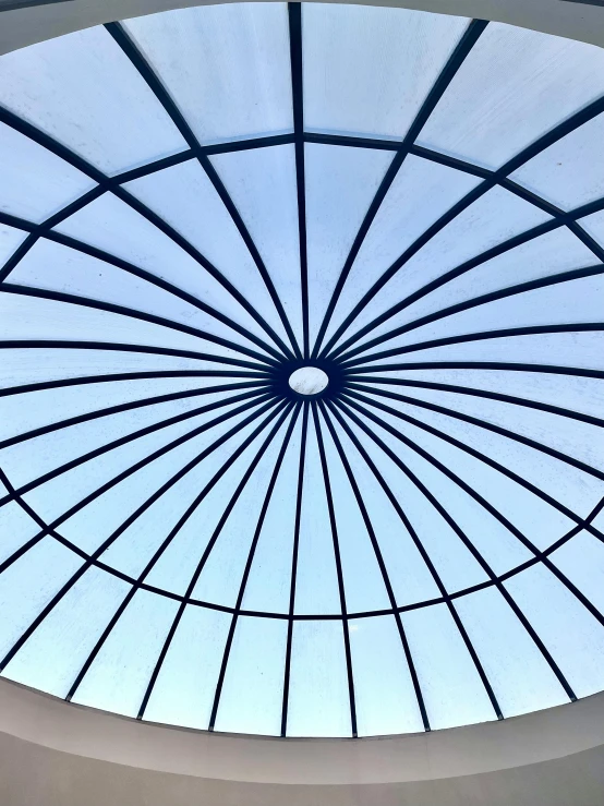 a ceiling with a blue skylight and no light in it